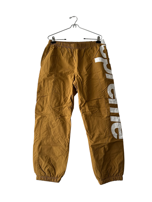 Supreme Nylon “Spellout” Track Pants